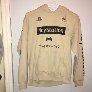 A tan PlayStation sweatshirt